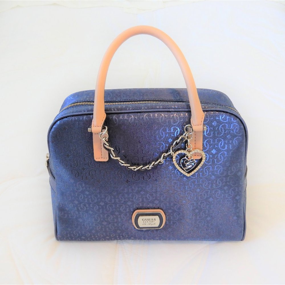 Authentic Blue GUESS Handbag with unique design and accents